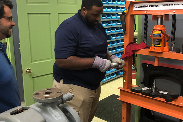 Students Using a Bearing Press