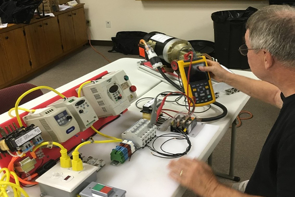 A student working with motor controls