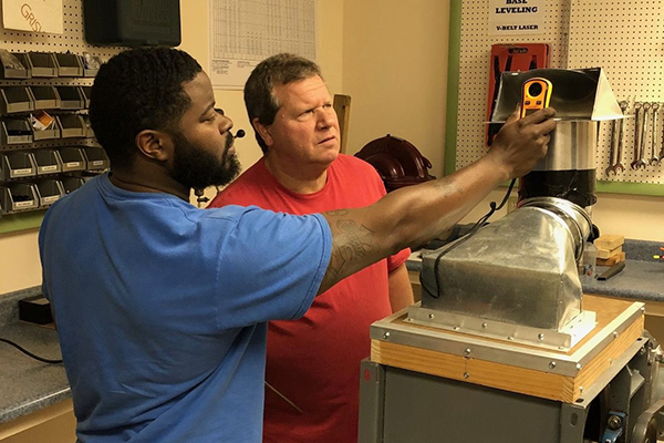 Students testing equipment