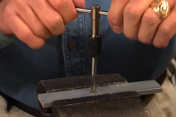Student drilling and tapping