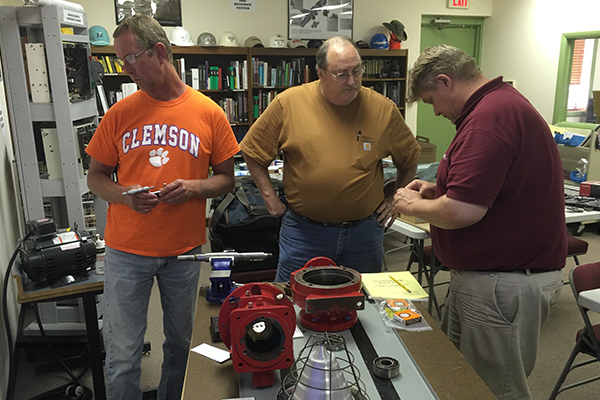 Student performing an OD Installation of a Bearing