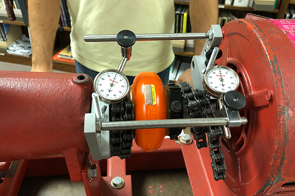 Students working on equipment in the training center